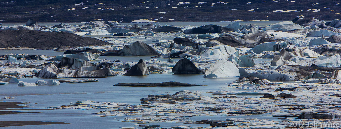 Lowell Lake full of icebergs at the foot of Lowell Glacier in the Yukon, Canada