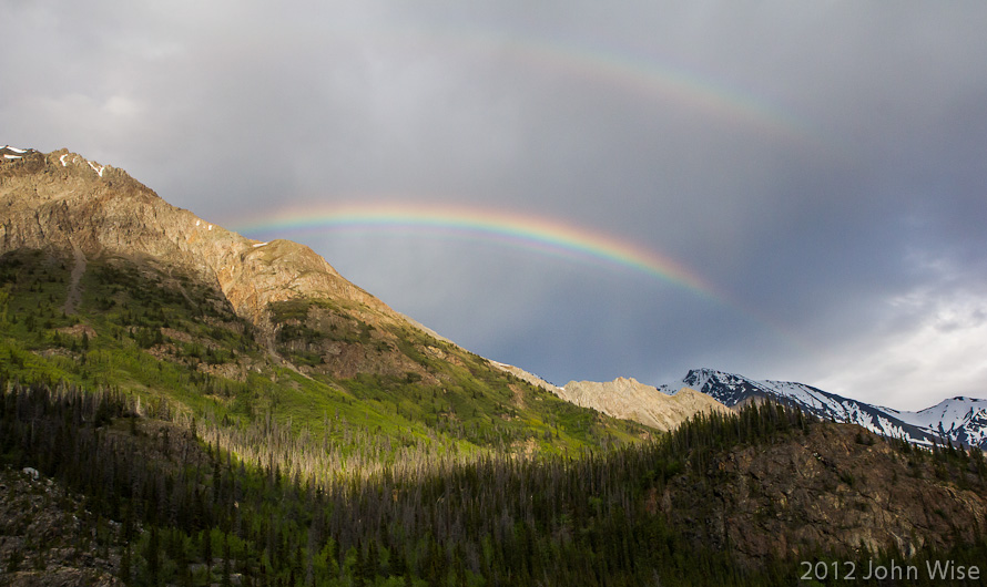 A double rainbow greets us at camp where the Dezdeash River is becoming the Alsek in the Yukon Territory of Canada