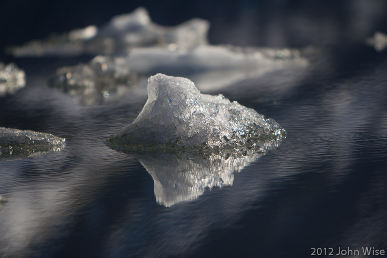 Piece of iceberg slowly floating on a journey to somewhere. Kluane National Park Yukon, Canada